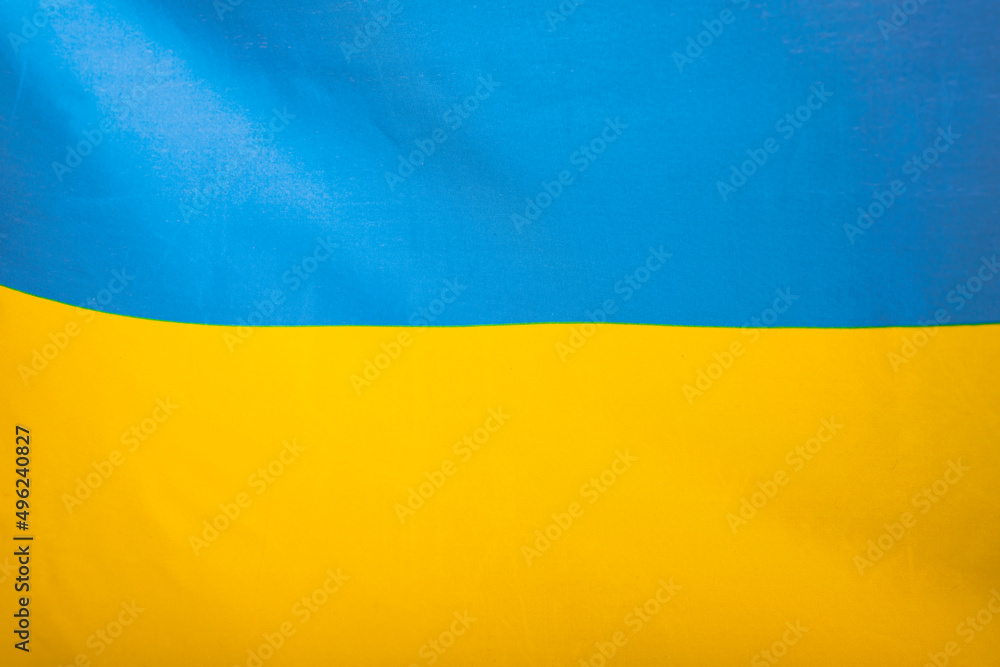 Fototapeta premium National flag of Ukraine fabric textile background