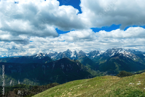 Panoramic view in spring from Frauenkogel on mount Mangart in the Julian Alps, Friuli, Italy. Border Austria, Italy, Slovenia. Triglav National Park. Upper Drava valley. Summit photo