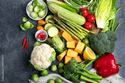 Delicious raw fruits and vegetables on  background.