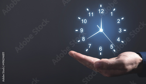Male hand showing clock. Time Management