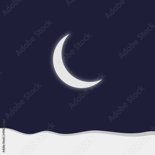 The moon shines in the sky without stars. Waning crescent. Snow road.