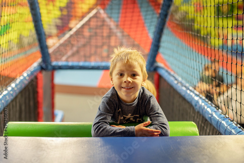 Child Plays in Play Center photo