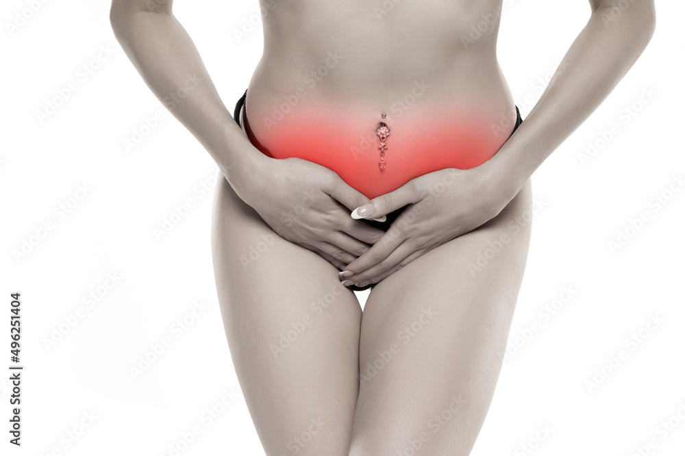 Naklejka premium Young female suffering form abdominal pain on white background .