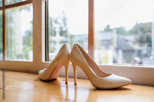 woman’s shoes on a window sill..