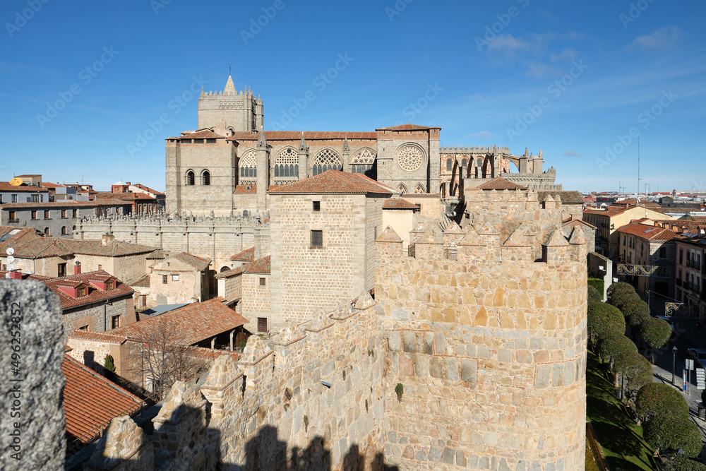 Ávila Cathedral or Cathedral of the Saviour, a Catholic church in Ávila, Spain, seen from the fortified medieval walls. It was built in the late Romanesque and Gothic architectural traditions.