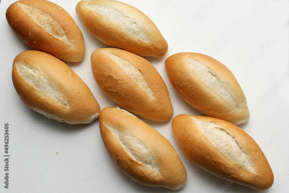Delicious, fresh, fluffy, crunchy, hot, freshly made bun mexican bread, french bread, white, loaf baked with wheat flour on white background ready to eat
Delicious, fresh, fluffy, crunchy, hot, freshly made bun mexican bread, french bread, white, loaf baked with wheat flour on white background ready to eat