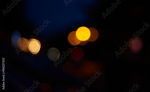 Dreamy light spots in the city at night © kody_king