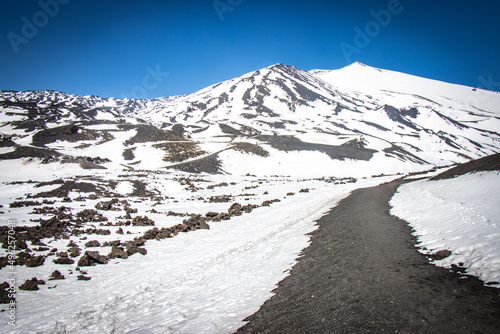 snow on etna, vulcano, sicily, italy, europe, lava stone, black, crateri silvestri photo