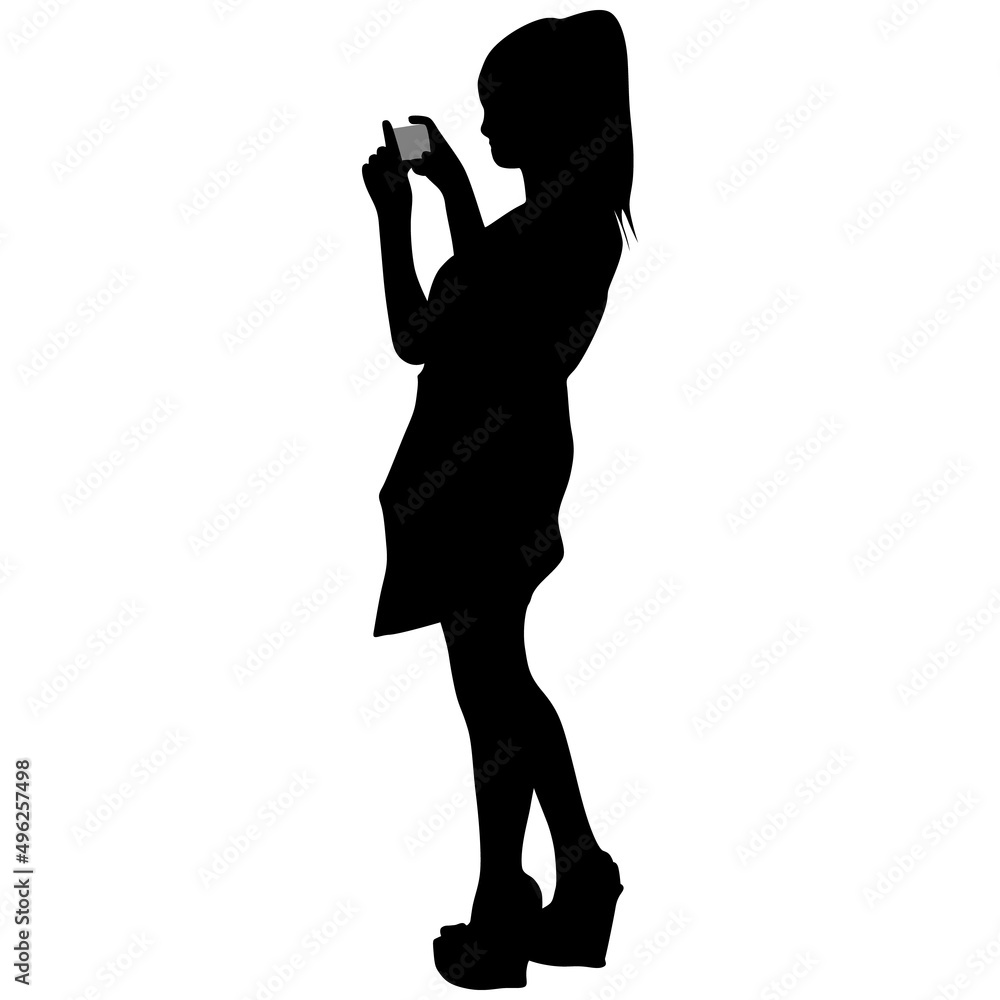 Black silhouette of slender girl with phone in her hands