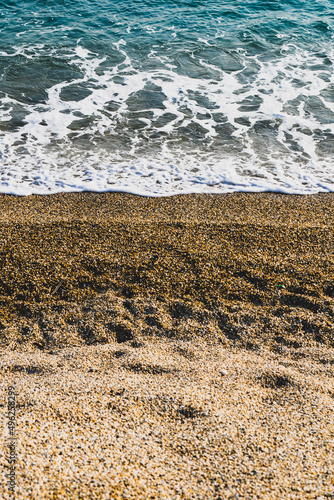 waves at sunset on the beach of Varigotti in Liguria  Italy