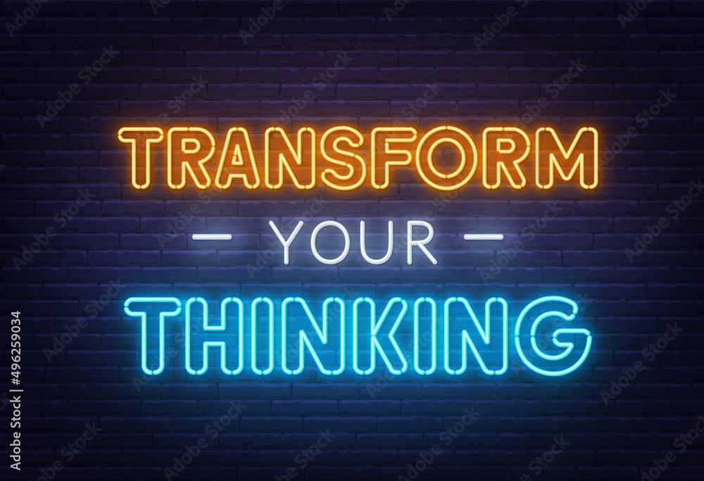 Transform your thinking neon lettering on brick wall background.