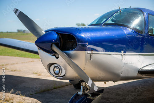 close-up of the nose of a light aircraft with propeller