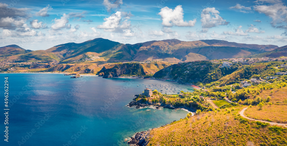Obraz premium Aerial summer view from flying drone of historical place - Crawford Tower. Majestic morning scene of Italian countryside. Wonderful seascape of Mediterranean seascape, Italy, Europe.