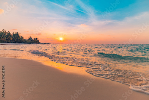Fototapeta Naklejka Na Ścianę i Meble -  Sea sand sky concept, sunset colors clouds, horizon, horizontal background banner. Inspirational nature landscape, beautiful colors, wonderful scenery of tropical beach. Beach sunset, summer vacation

