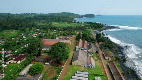 Aerial drone view overlooking the Roca agua Ize village, in sunny Sao Tome, Africa