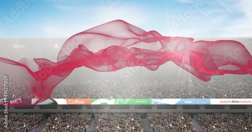 Composite image of red digital wave against sports stadium in background