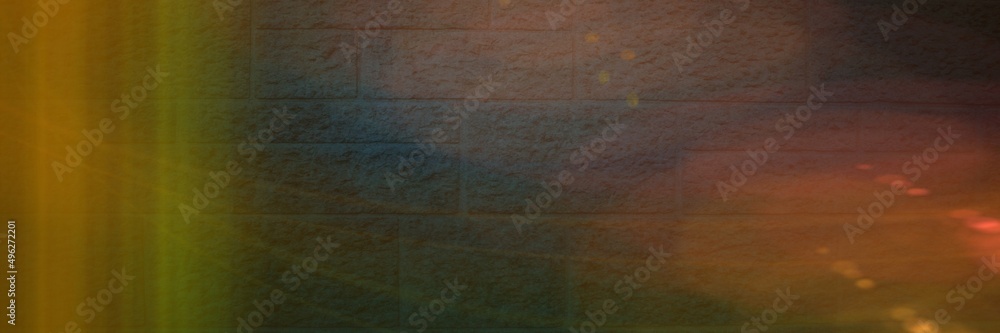 Spots of light over grey brick wall background with copy space