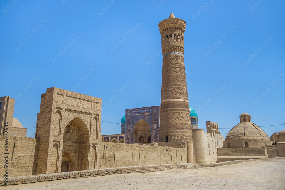 Panorama of the buildings of the Poi-Kalyan architectural ensemble in Bukhara, Uzbekistan. In the center is the Kalyan minaret, one of the oldest buildings in the city (built in 1127)