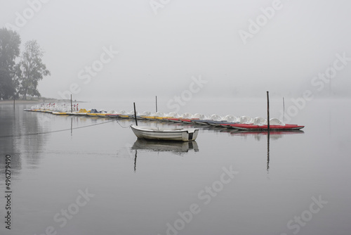 Pleasure boats in a misty lake