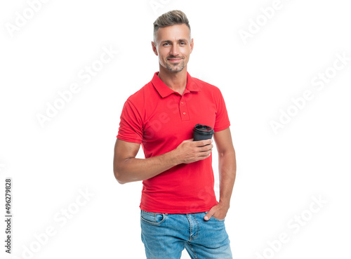 Happy man in casual red tshirt holding disposable cup with takeaway tea isolated on white