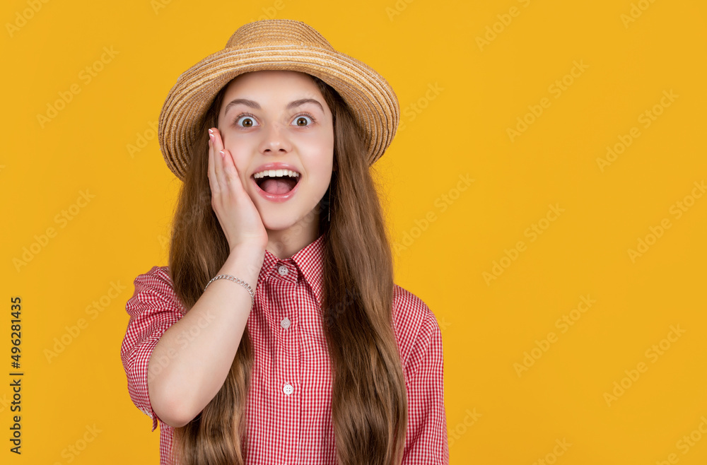 amazed kid in straw hat on yellow background amazed kid in straw hat on yellow background