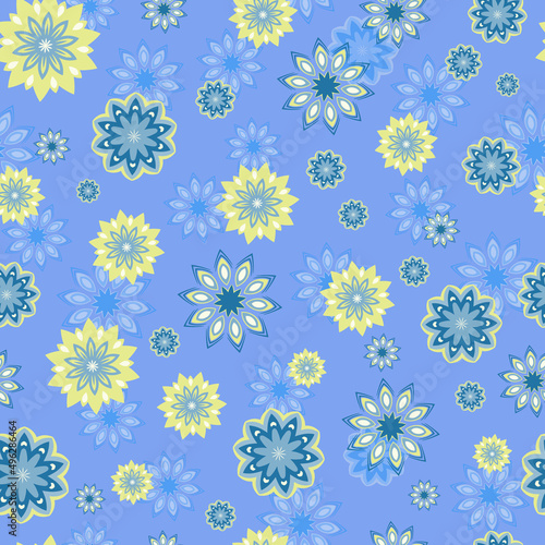 Flowers in shades of yellow and blue on a light blue background. Seamless vector pattern
