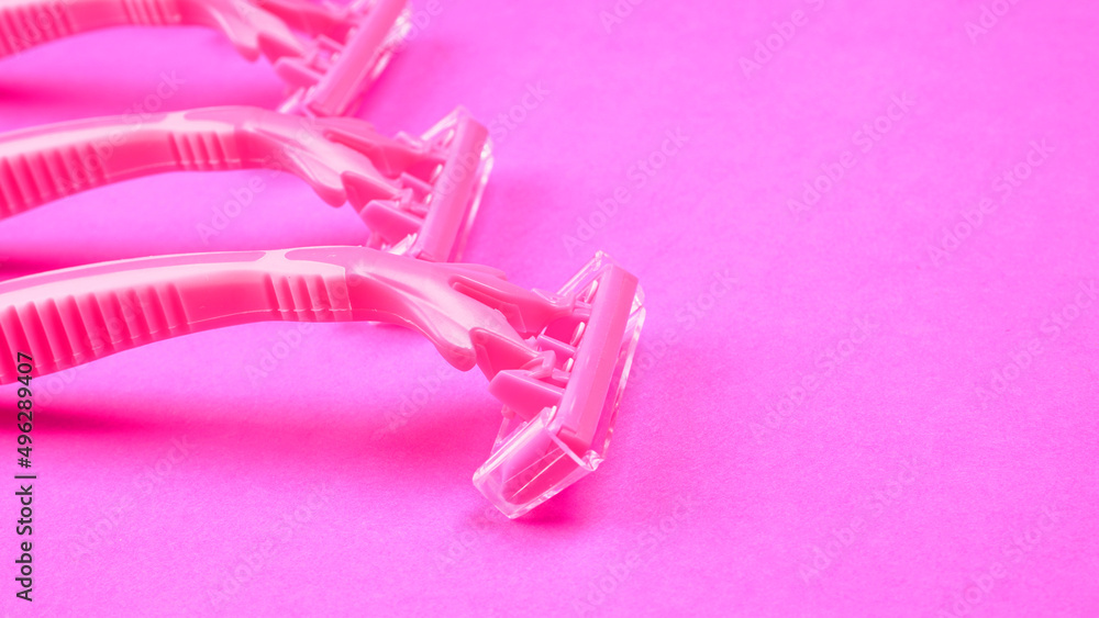 New pink disposable razors for safe shaving of female skin.Razor for smooth shaving. Sharp razors for personal hygienic routine. selective focus.
New pink disposable razors for safe shaving of female skin.Razor for smooth shaving. Sharp razors for personal hygienic routine. selective focus.