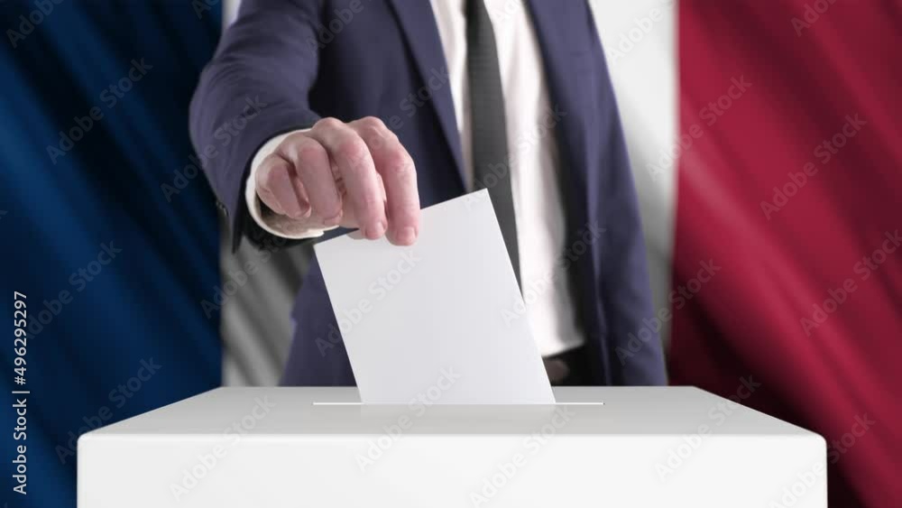 Voting. Man Putting a Ballot into a Voting Box with French Flag on Background.
Voting. Man Putting a Ballot into a Voting Box with French Flag on Background.
