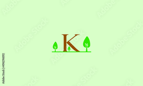 Initial letter K garden with trees landscape template
