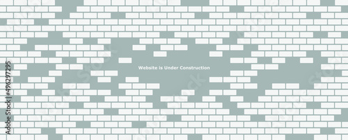 Website is under construction text and brick background. © selim