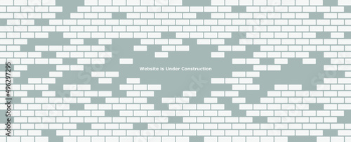 Website is under construction text and brick background.	
