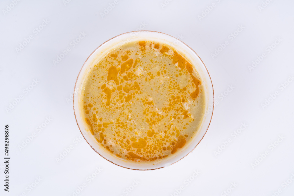 Cropped view of lentil soup shot from an overhead angle on an isolated white background. Cropped view of lentil soup shot from an overhead angle on an isolated white background.