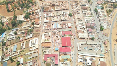road divides several blocks of houses in Kenya. aerial drone view of rural community in kamatira, west pokot, kapenguria, Kenya. footage of a country that often suffers from water shortages photo