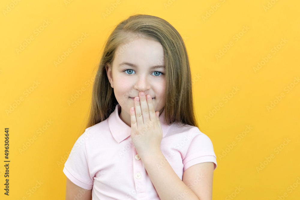 Childhood and people concept - surprised or frightened little girl screaming Childhood and people concept - surprised or frightened little girl screaming