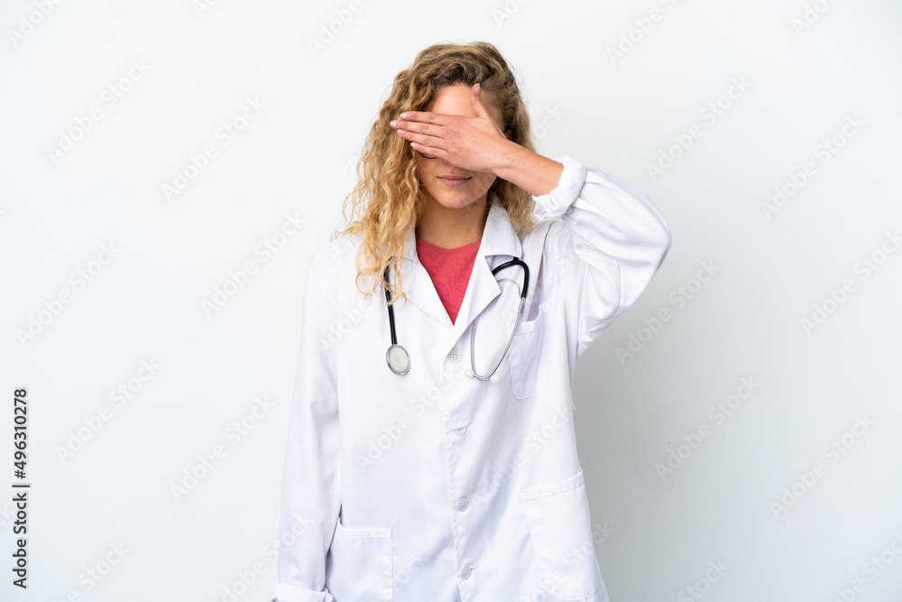 Young doctor blonde woman isolated on white background covering eyes by hands. Do not want to see something Young doctor blonde woman isolated on white background covering eyes by hands. Do not want to see something