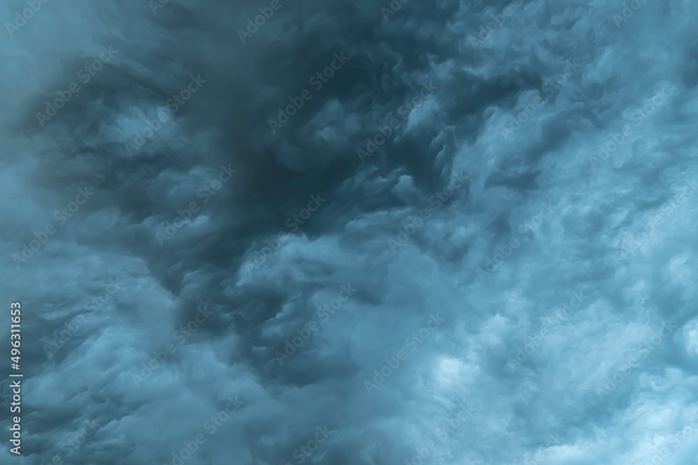 Abstract or illustration of turbulent waves dark gray color. or mixed clouds in the sky.