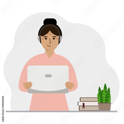 Woman with laptop and headphones. Working from home, student, freelancer, assistant, blogger or businessman. Home office concept.