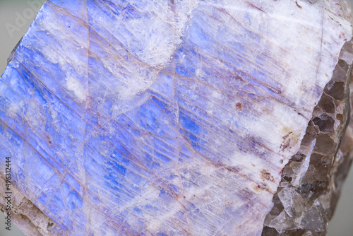 Mineral Oligoclase. or Belomorit. Background, texture. Selective focus. Beautiful abstract blue pattern. Soft focus photo