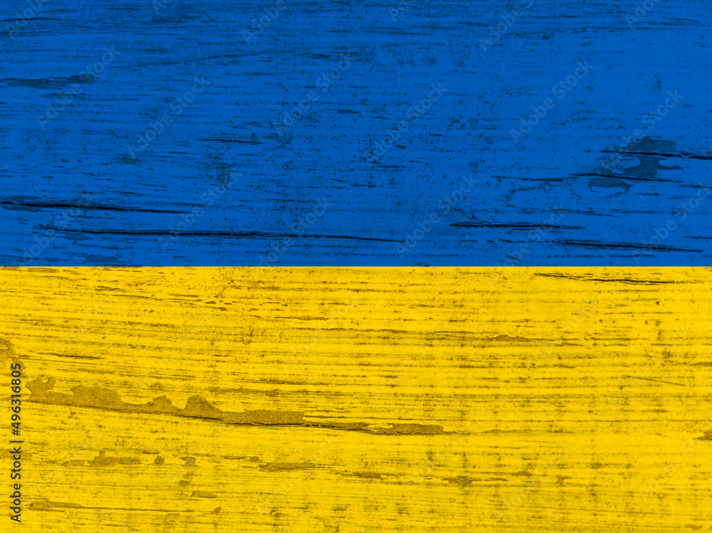 Ukrainian flag painted. Wrinkled blue and yellow colored background