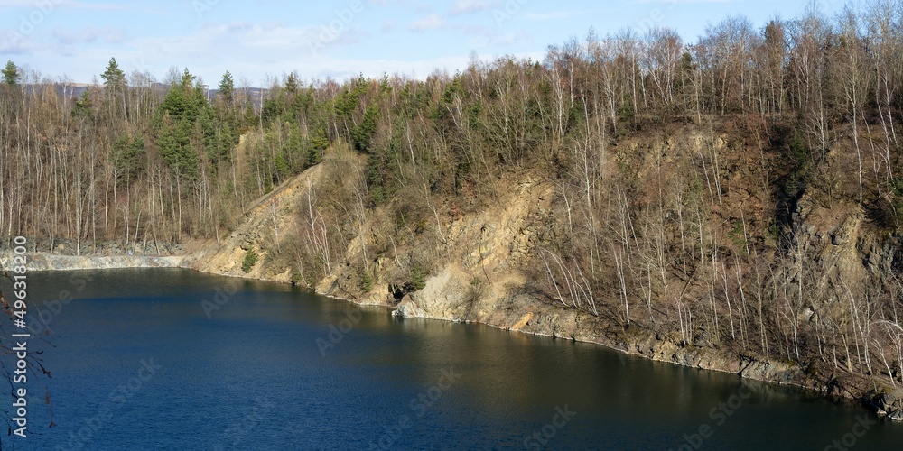 Vykleky. View of the old flooded quarry in early spring. Central Moravia. Europe. Vykleky. View of the old flooded quarry in early spring. Central Moravia. Europe.