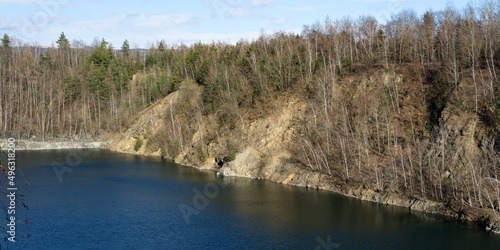 Vykleky. View of the old flooded quarry in early spring. Central Moravia. Europe. 