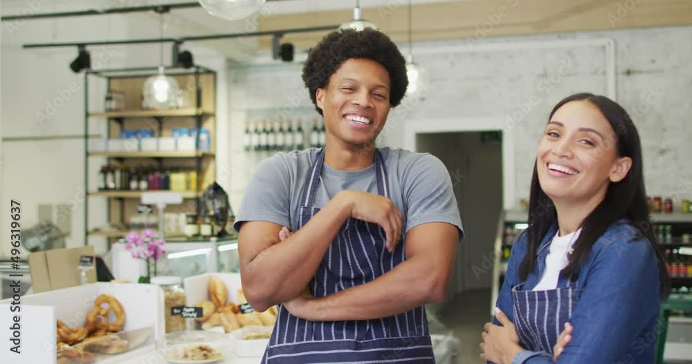 Animation of happy diverse female and male waiters at coffee shop Animation of happy diverse female and male waiters at coffee shop
