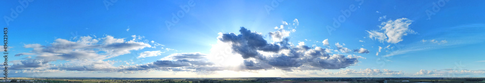 Impressive panoramic shot of the horizon with a great blue sky with clouds Impressive panoramic shot of the horizon with a great blue sky with clouds