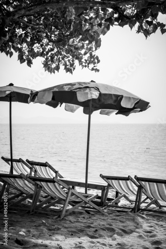 Fototapeta Naklejka Na Ścianę i Meble -  Beach in Thailand with chaise longues and parasols
