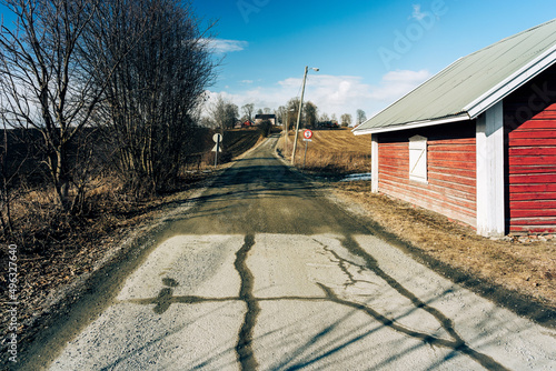 a rural gravel road in spring