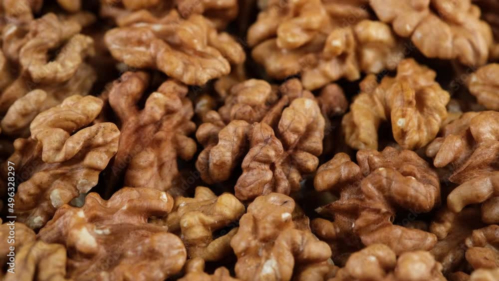Walnuts without shell close up, sliding shot. Healthy vegan food concept Walnuts without shell close up, sliding shot. Healthy vegan food concept