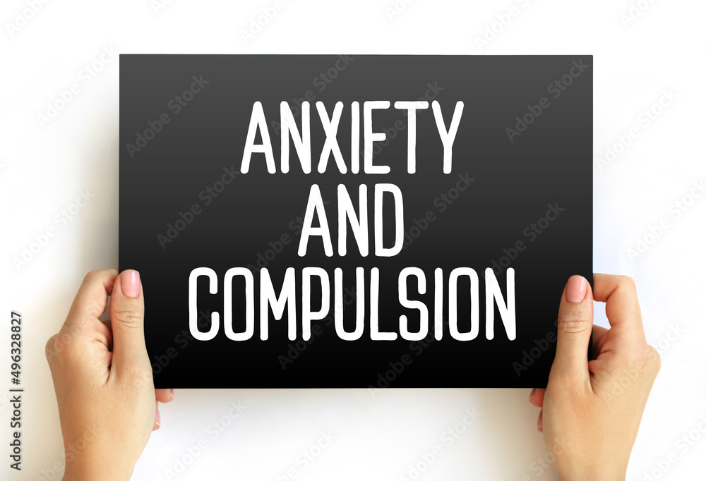Anxiety and Compulsion text concept on card for presentations and reports Anxiety and Compulsion text concept on card for presentations and reports
