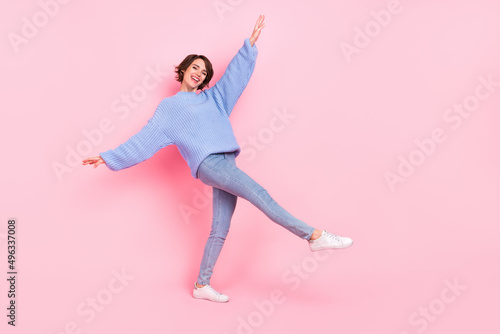Full size photo of positive excited girl have fun chilling free time weekend isolated on pink color background