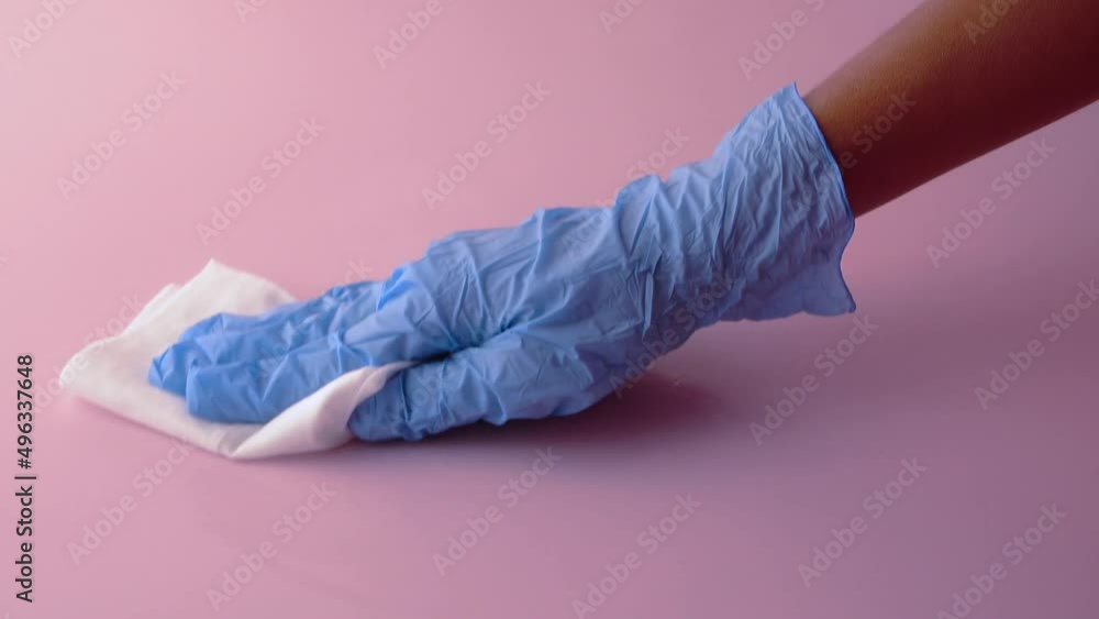 close up of person hand cleaning table with cloth close up of person hand cleaning table with cloth