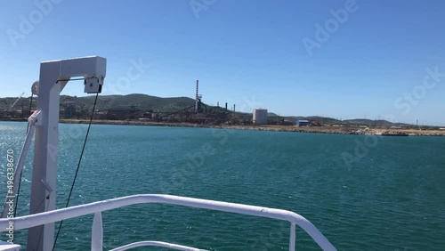 Leaving Piombino port, Italy, the blue sea in summer time